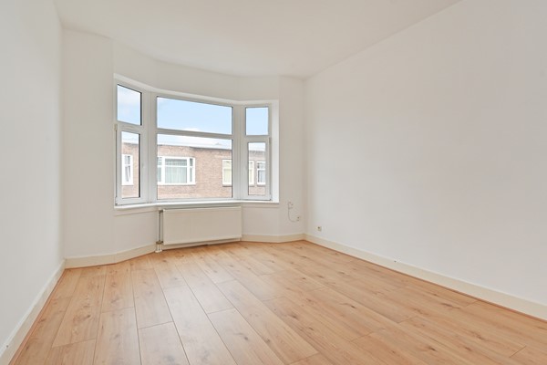 Medium property photo - Deimanstraat 309, 2522 BK Den Haag